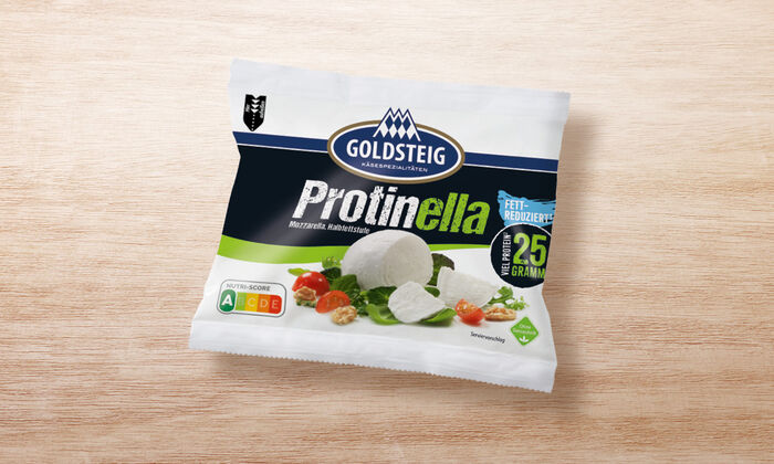Protinella Kugel von GOLDSTEIG in Verpackung auf Holztisch