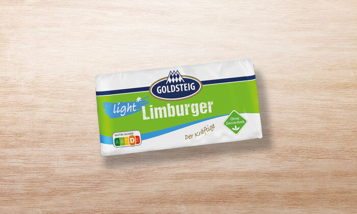 Limburger leicht von GOLDSTEIG in Verpackung auf Holztisch 