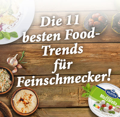 Die 11 besten Food-Trends für Feinschmecker 2023 - mit Bildern der aktuellen Food-Trends sowie dem Bambini Mozzarella Mini von GOLDSTEIG in Verpackung auf Holztisch - Schriftzug: Die 11 besten Food-Trends für Feinschmecker!