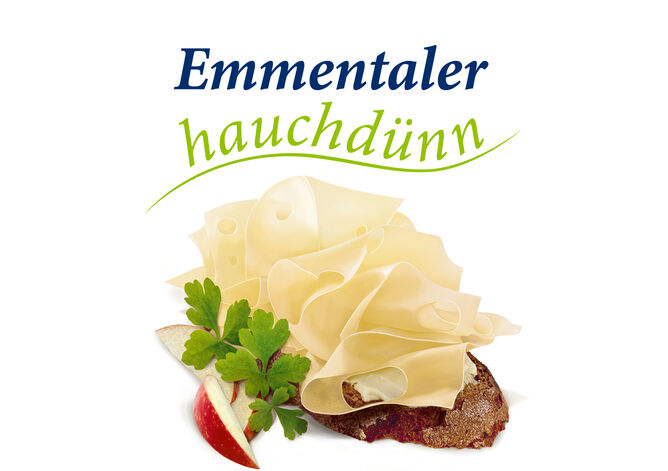 Emmentaler Scheiben - GOLDSTEIG Käsespezialitäten Emmentaler Scheiben von GOLDSTEIG mit Petersilie und Apfelspalten auf Brot