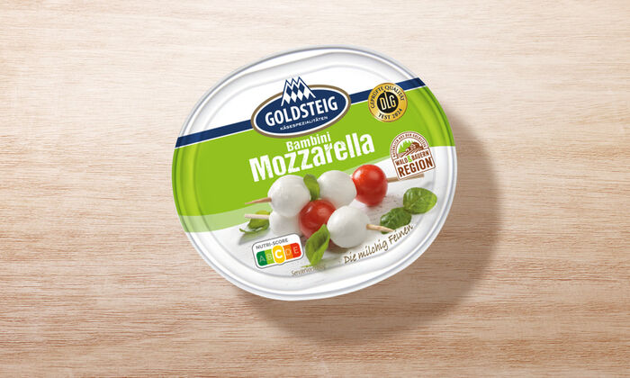 Bambini Mozzarella Mini Classic von GOLDSTEIG in Verpackung auf Holztisch